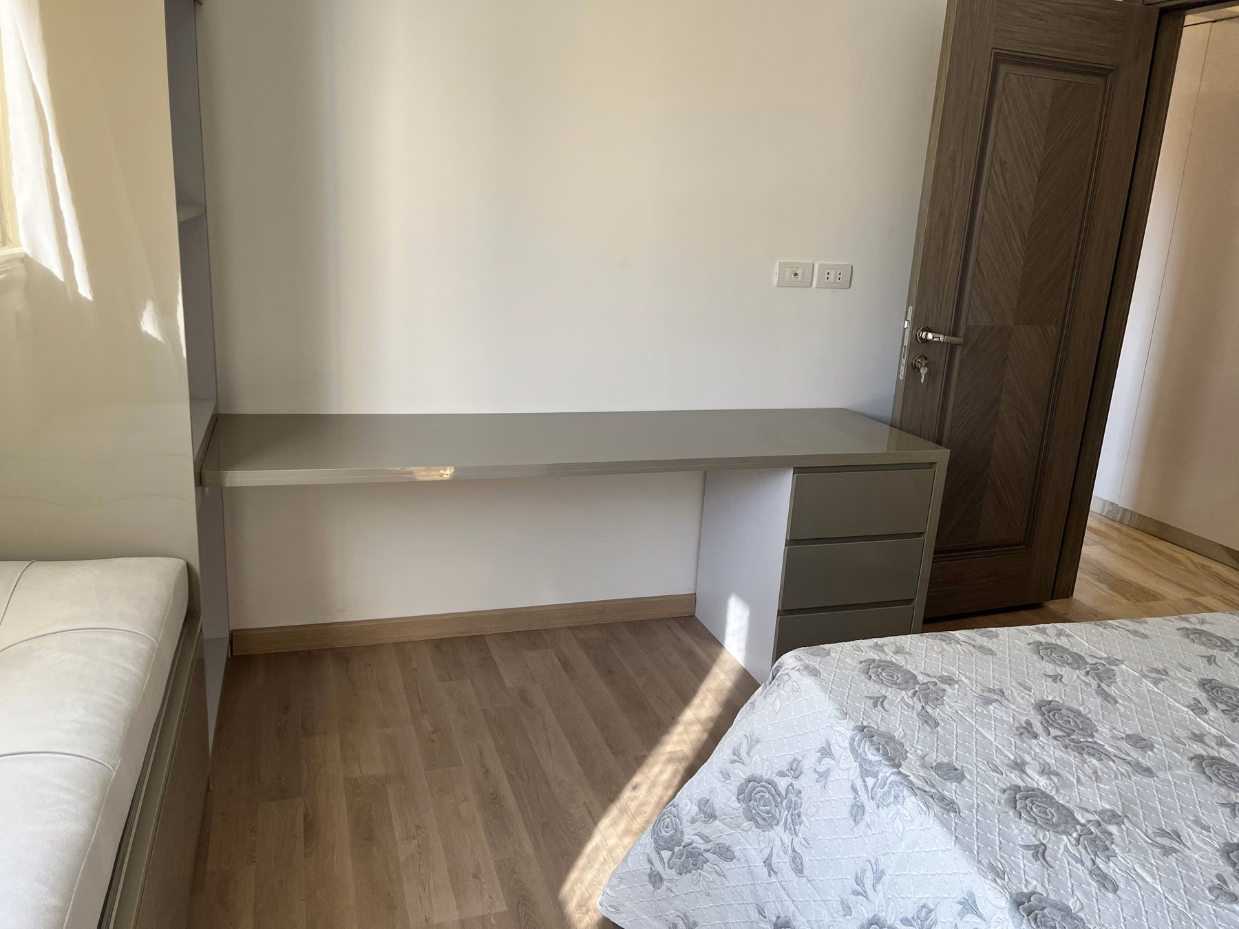 Bedroom with a double bed and built-in storage